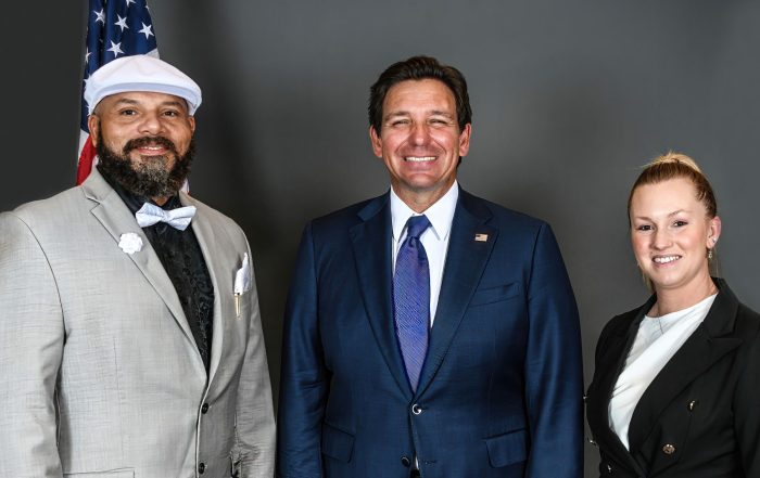 CEO of CCFG, Curtis Fort, stands with Florida Governor Ron DeSantis.